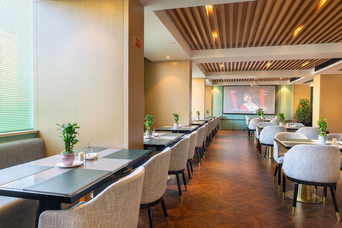 Imagen del bar/restaurante del Hotel y&igrave; wū sh&igrave; b&oacute; y&igrave; měi jū hotel. Foto 3