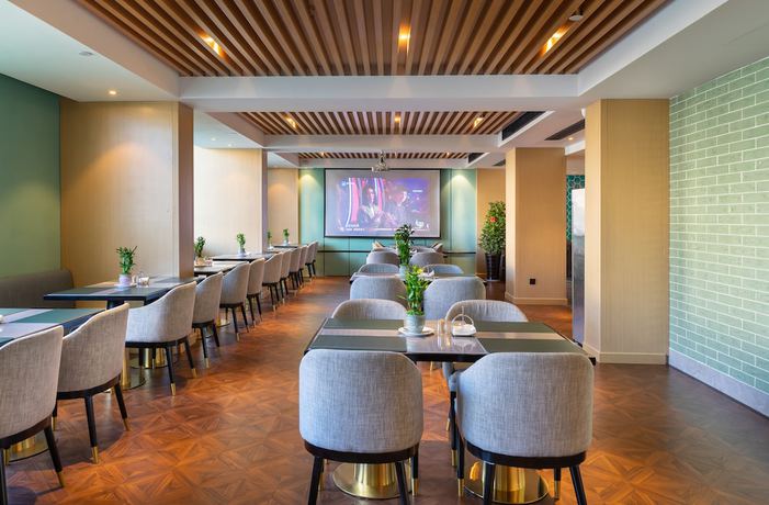 Imagen del bar/restaurante del Hotel y&igrave; wū sh&igrave; b&oacute; y&igrave; měi jū hotel. Foto 4
