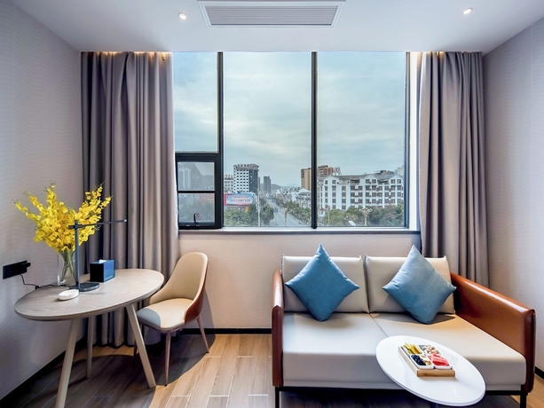 Imagen de la habitación del Hotel yishangjiudianhechibamadian. Foto 6