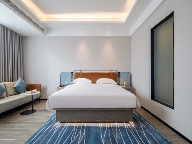 Imagen de la habitación del Hotel yishangjiudianhechibamadian. Foto 8