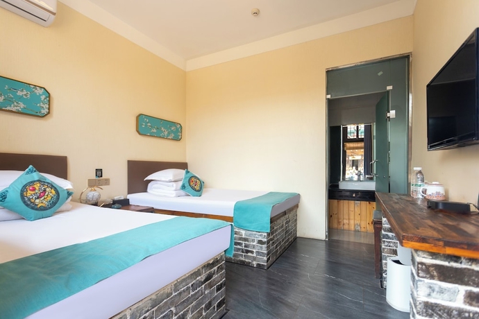 Imagen de la habitación del Hotel yunzhikeshepingyaoguchengxianyadian. Foto 9
