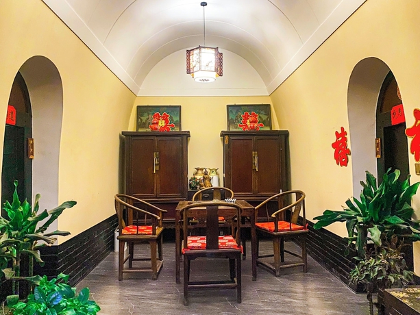 Imagen del bar/restaurante del Hotel yunzhikeshepingyaoguchengxianyadian. Foto 6