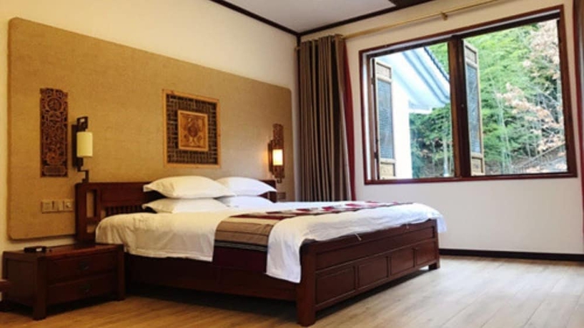 Imagen de la habitación del Hotel zhouningfenggushanju. Foto 5