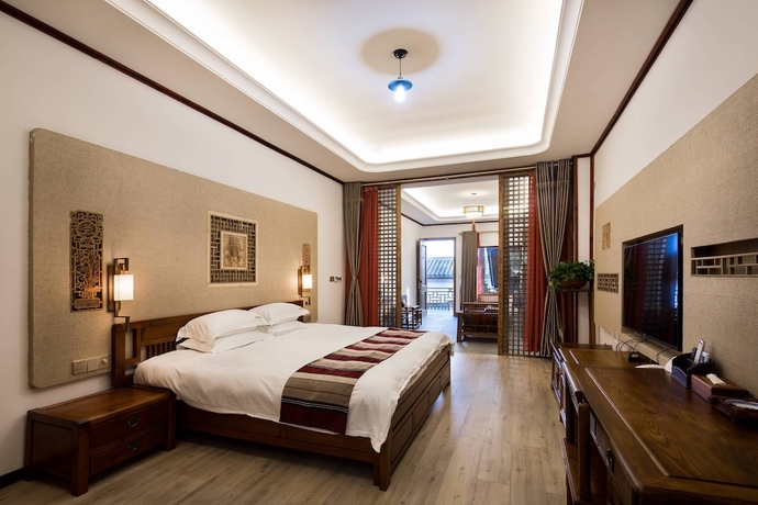 Imagen de la habitación del Hotel zhouningfenggushanju. Foto 6
