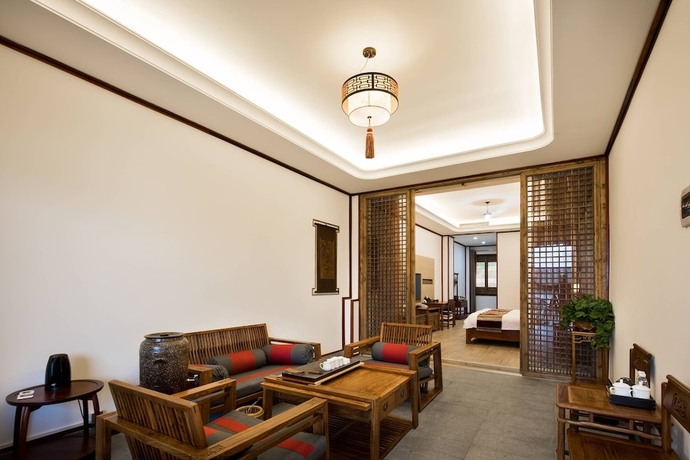 Imagen de la habitación del Hotel zhouningfenggushanju. Foto 7