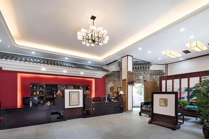 Imagen de los interiores del Hotel zhouningfenggushanju. Foto 13