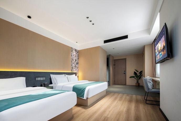 Imagen de la habitación del Hotel zhuyingwanghehuayuanjiudian. Foto 5