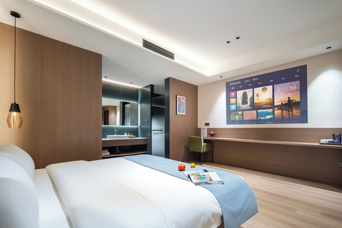 Imagen de la habitación del Hotel zhuyingwanghehuayuanjiudian. Foto 8