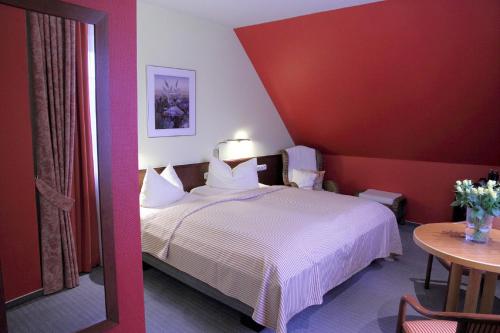 Imagen de la habitación del Hotel zur Altstadt, Alte Heide. Foto 7