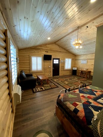 Imagen de la habitación del Lodge Cabin Village. Foto 16