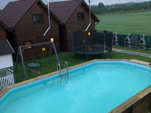 Imagen de la piscina del Lodge Domki letniskowe Nadia 1. Foto 20