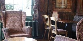 Imagen del bar/restaurante del Lodge Feathers Inn. Foto 2