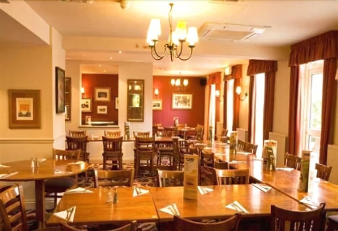 Imagen del bar/restaurante del Lodge Highwayman Hotel. Foto 5