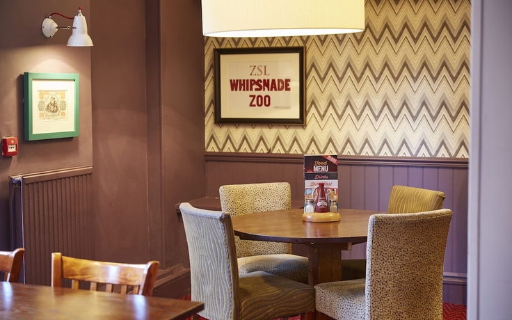 Imagen del bar/restaurante del Lodge Highwayman Hotel. Foto 9
