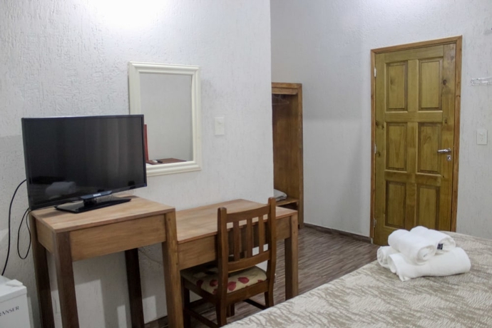 Imagen de la habitación del Lodge Palo Rosa. Foto 17
