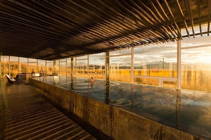 Imagen de la piscina del Lodge Remota. Foto 11