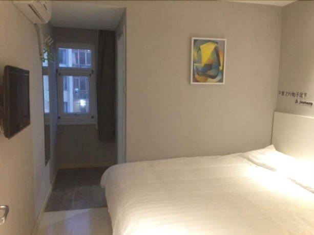 Imagen de la habitación del Motel 168 Dalian Jiefang Plaza. Foto 15