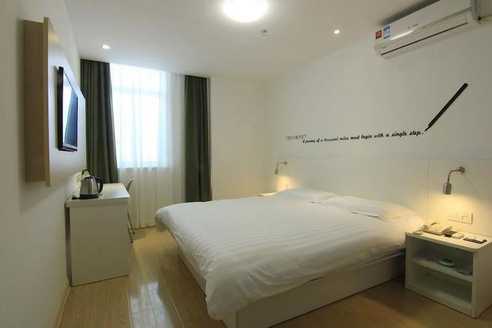 Imagen de los interiores del Motel 168 Shanghai Nanjing Road. Foto 15