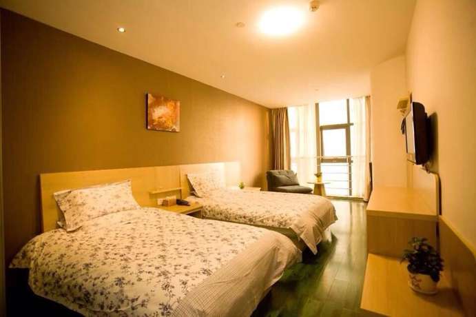 Imagen de la habitación del Motel 168 Suzhou Wuzhong Mart. Foto 13