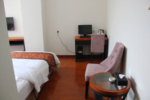 Imagen de la habitación del Motel 318 Express Xichang. Foto 1