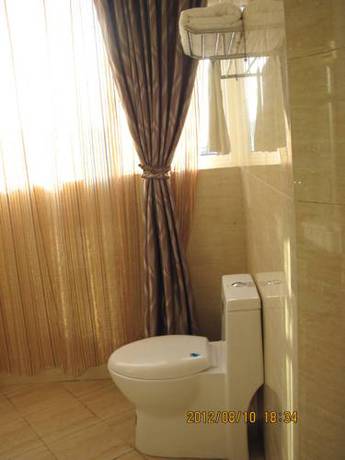 Imagen de la habitación del Motel 318 Express Xichang. Foto 3