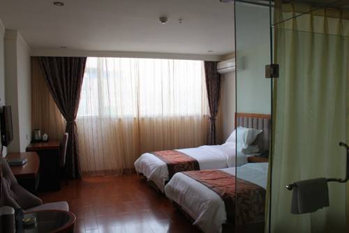 Imagen de la habitación del Motel 318 Express Xichang. Foto 6