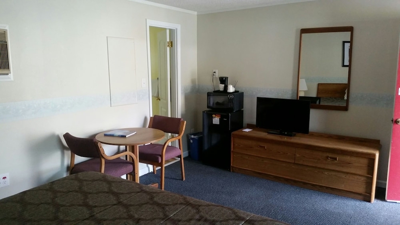 Imagen de la habitación del Motel A Holiday. Foto 10