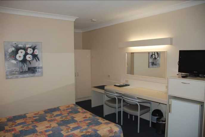 Imagen de la habitación del Motel Acacia Griffith. Foto 4