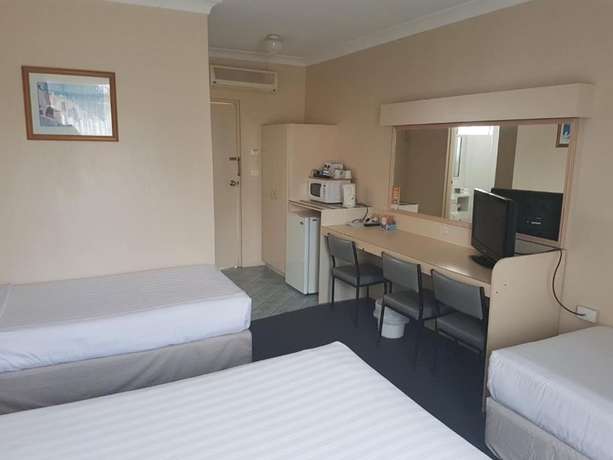 Imagen de la habitación del Motel Acacia Griffith. Foto 7