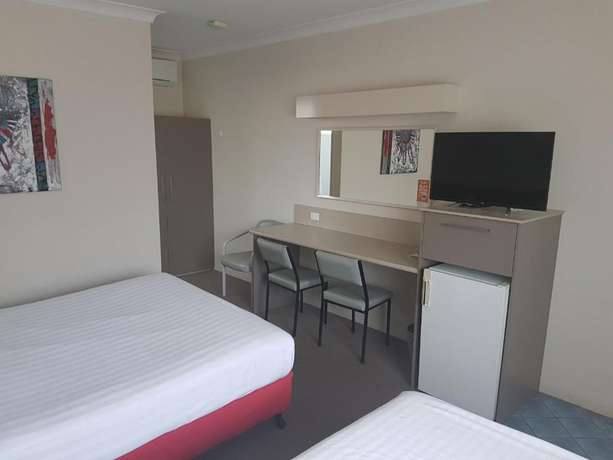 Imagen de la habitación del Motel Acacia Griffith. Foto 10