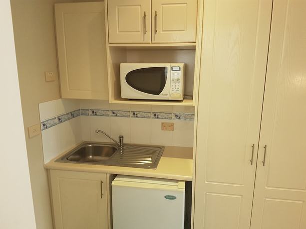 Imagen de la habitación del Motel Acacia Griffith. Foto 14