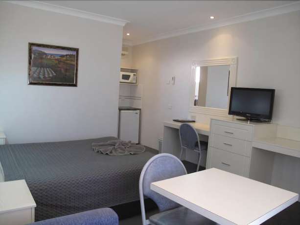 Imagen de la habitación del Motel Acacia Griffith. Foto 17
