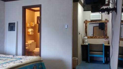 Imagen de la habitación del Motel Adobe Sands. Foto 10