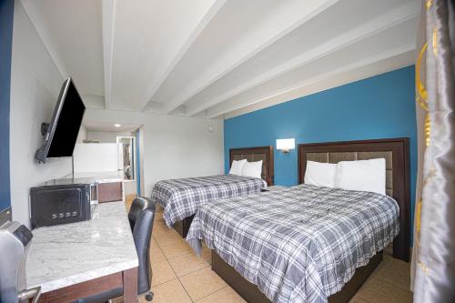 Imagen de la habitación del Motel Aladdin Motel By OYO Merritt Island. Foto 12