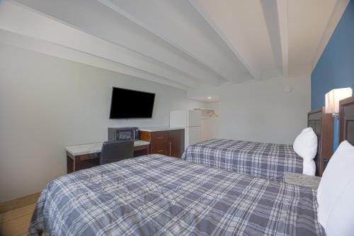 Imagen de la habitación del Motel Aladdin Motel By OYO Merritt Island. Foto 17