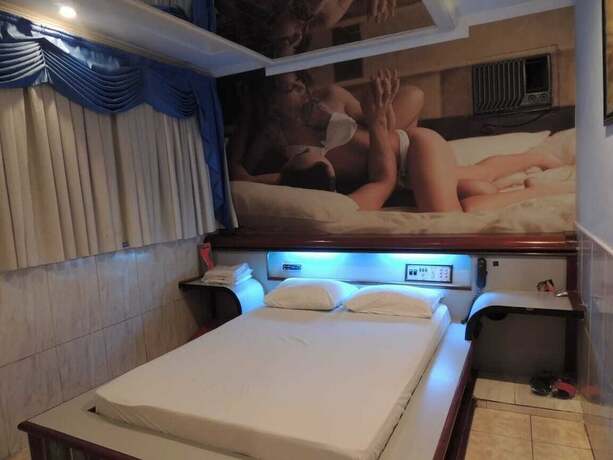 Imagen de la habitación del Motel America - Adults Only. Foto 19