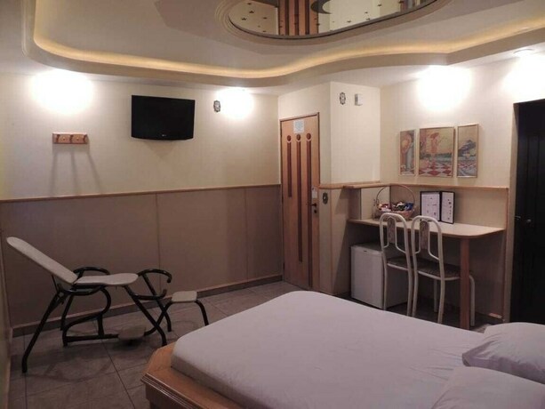 Imagen de la habitación del Motel America - Adults Only. Foto 27