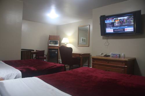 Imagen de la habitación del Motel American Plaza. Foto 4
