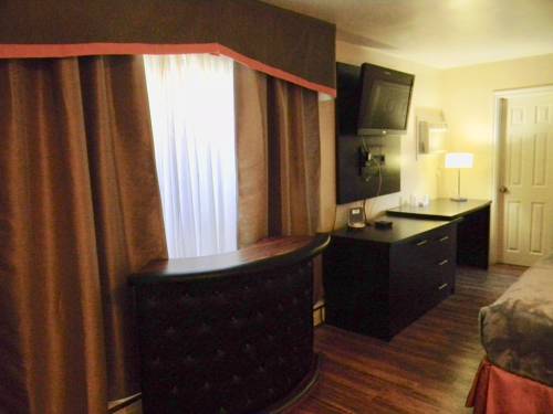 Imagen de la habitación del Motel American Plaza. Foto 11