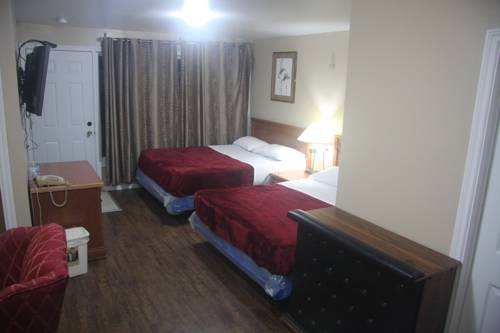 Imagen de la habitación del Motel American Plaza. Foto 16