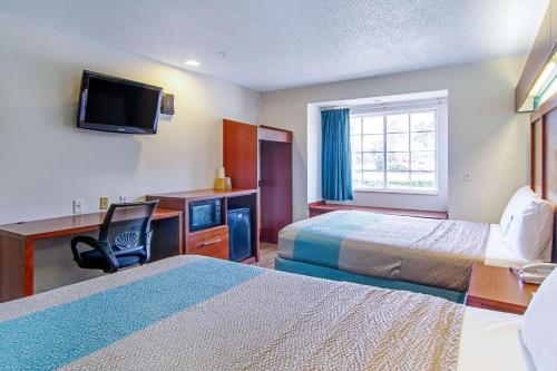 Imagen de la habitación del Motel Americas Best Value Inn & Suites Brunswick. Foto 17