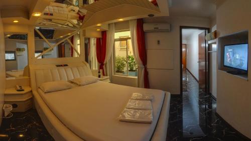 Imagen de la habitación del Motel Aquarius (adults Only). Foto 5