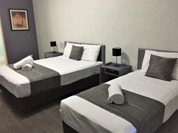 Imagen de la habitación del Motel Archer Park. Foto 21