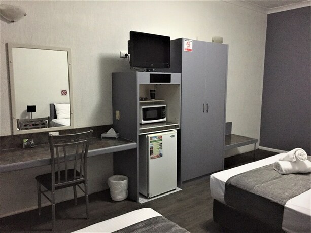 Imagen de la habitación del Motel Archer Park. Foto 24