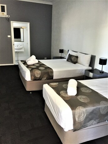 Imagen de la habitación del Motel Archer Park. Foto 25