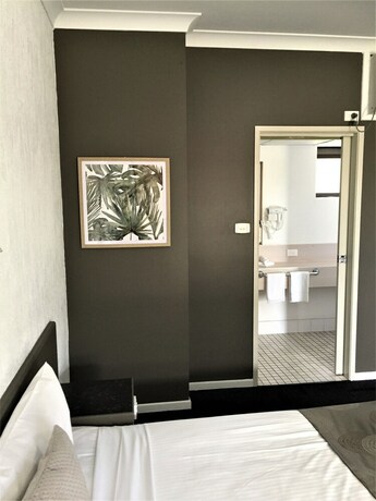 Imagen de la habitación del Motel Archer Park. Foto 31