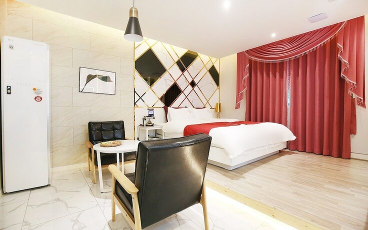 Imagen de la habitación del Motel Asan Some Self Check-in. Foto 26