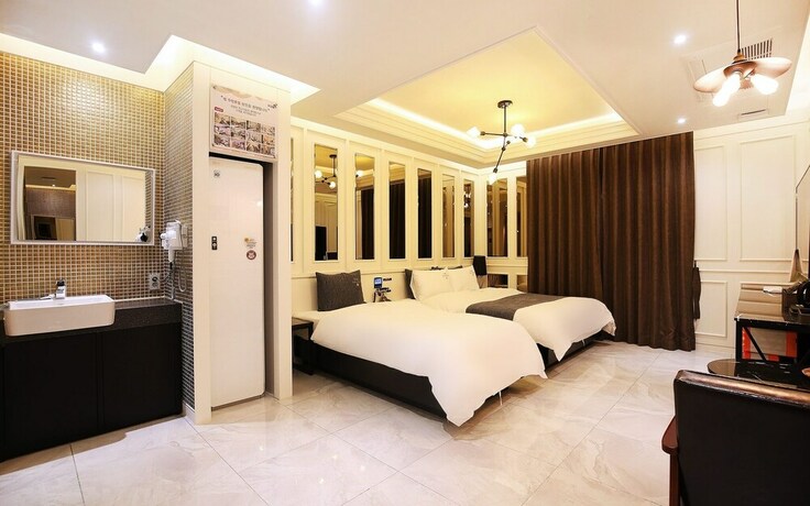 Imagen de la habitación del Motel Asan Some Self Check-in. Foto 27