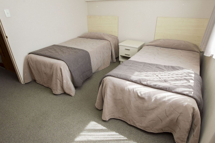 Imagen de la habitación del Motel Aspen Manor. Foto 16