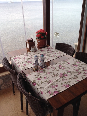 Imagen de los interiores del Motel Assos Nazan Restoran Beach. Foto 17